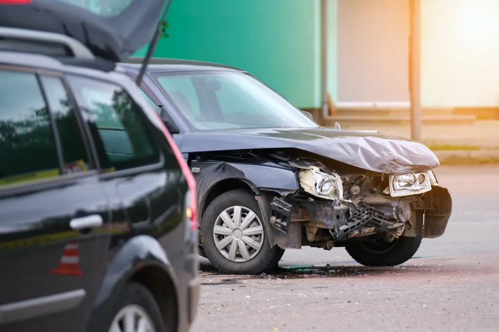 Two cars with front-end damage after a collision