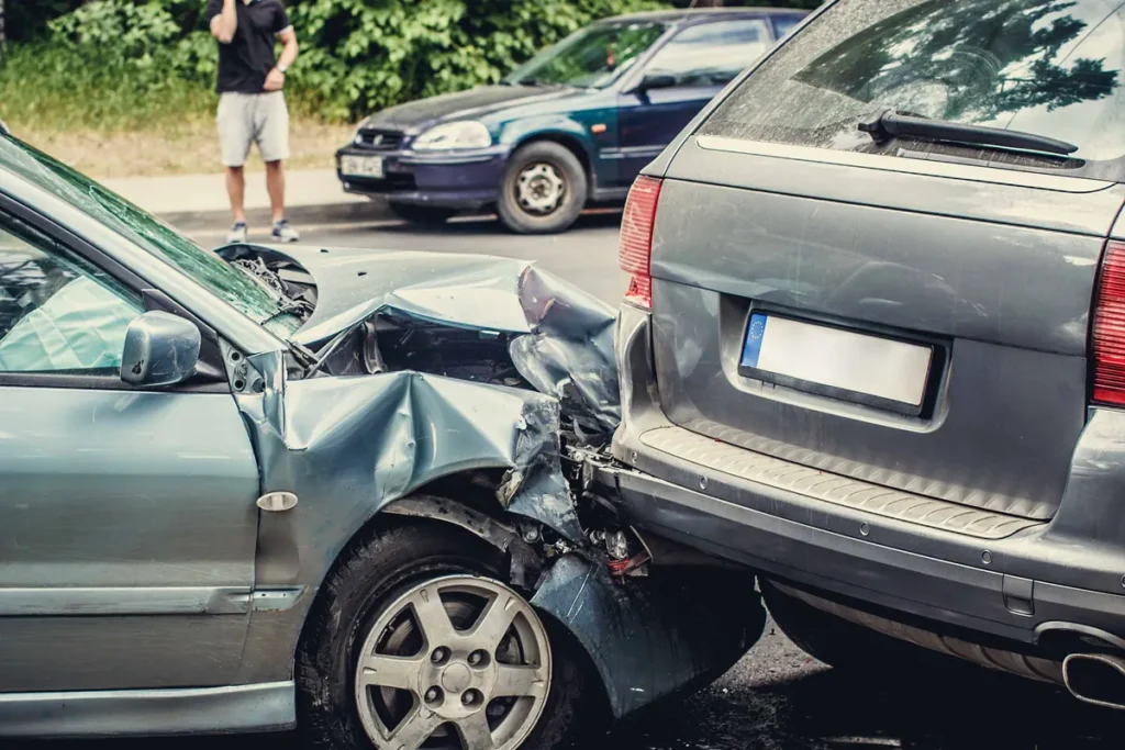 Two cars after a collision on a neighborhood street