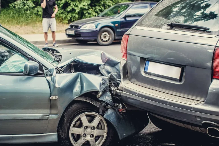Two cars after a collision on a neighborhood street